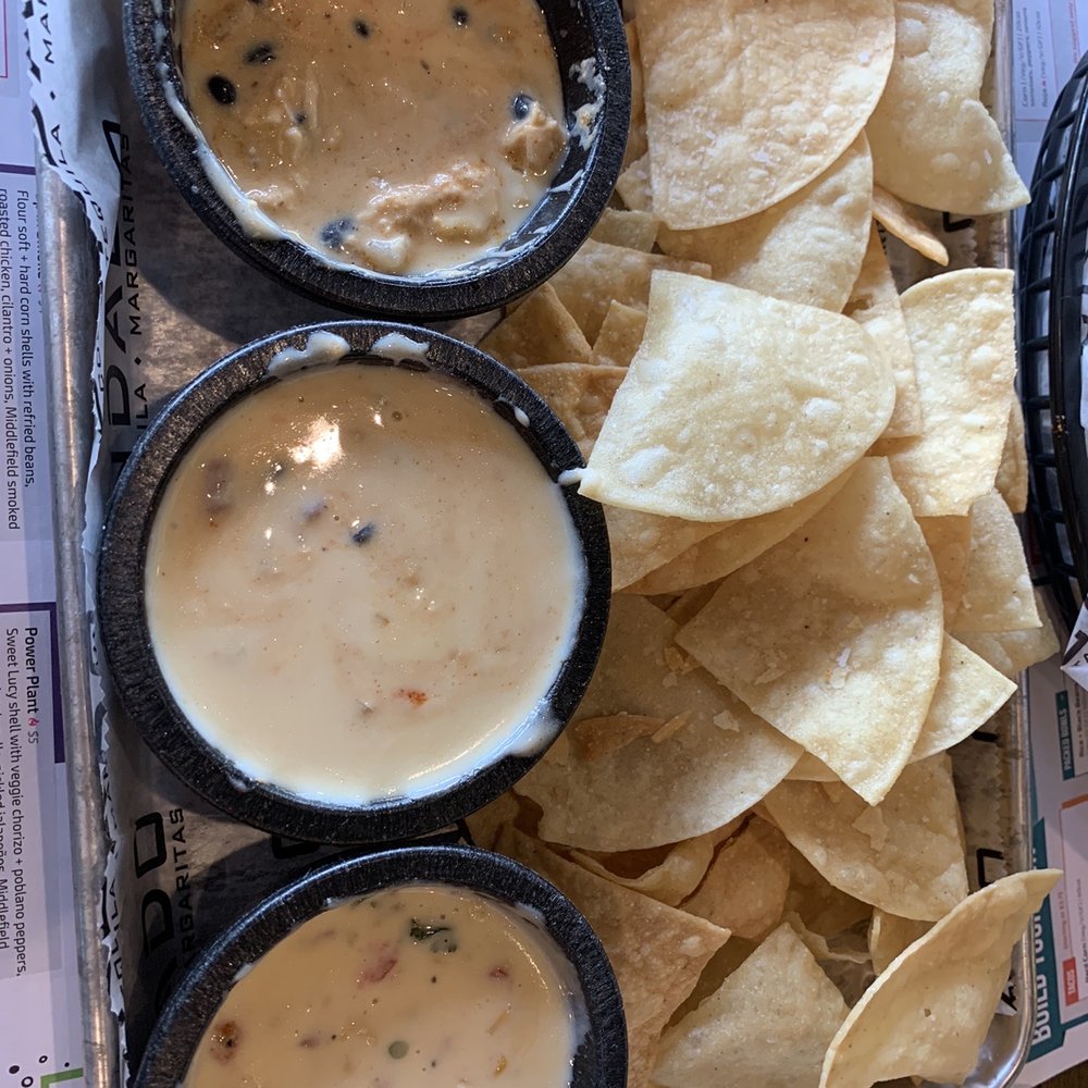 Condado Tacos - Forgot to photo before we started. Triple dip (we selected all quesos). Dirty was our fave. - Tacos Near Me - Carmel, Indiana Condado Tacos - Forgot to photo before we started. Triple dip (we selected all quesos). Dirty was our fave. - Tacos Near Me - Carmel, Indiana