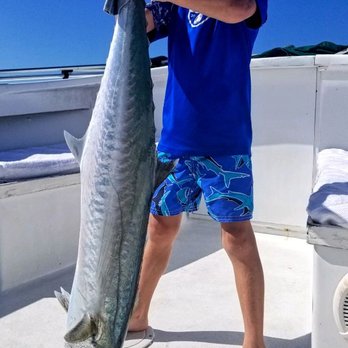 Catchin' Jiants Charters - Kingfish bigger than the kid - Boat Charters Near Me - Captiva, Florida Catchin' Jiants Charters - Kingfish bigger than the kid - Boat Charters Near Me - Captiva, Florida
