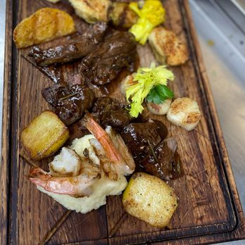 Twin Door Tavern - Delicious Surf n' Turf Platter Served with Grilled Shrimp, Scallops, Filet Mignon and Roasted Potatoes - American Near Me - Maywood, New Jersey Twin Door Tavern - Delicious Surf n' Turf Platter Served with Grilled Shrimp, Scallops, Filet Mignon and Roasted Potatoes - American Near Me - Maywood, New Jersey
