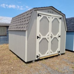 Woodland Sheds - Mini barns available in wood/vinyl and different colors/trims.