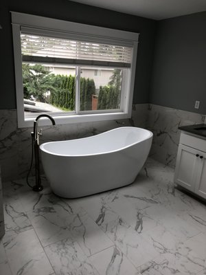 Bathroom Remodels - We are licensed General contractors for residential and commercial projects. Our company is involved in custom whole-house renovation and remodels, in addition to new-home construction. We offer every step needed from the foundation up. We can do framing, insulation, drywall, painting, tile work, hardwood floors, demo and installation of all exterior and interior fixtures.