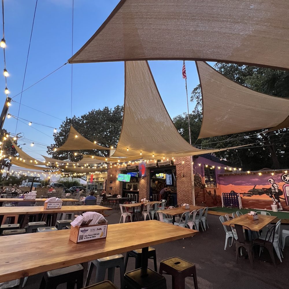 Standard at Roswell - tables and chairs under a canopy - Pizza Near Me - Atlanta, Georgia Standard at Roswell - tables and chairs under a canopy - Pizza Near Me - Atlanta, Georgia