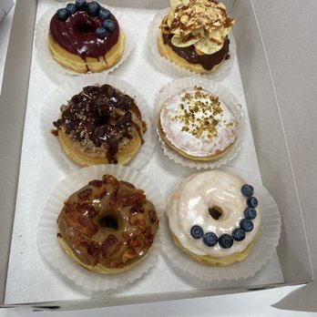 Donut Hub - Lemon with blueberry berry is my favorite. They were all delicious! - Donuts Near Me - Orange, California