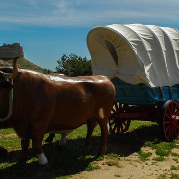 Scotts Bluff National Monument - A replica Conestoga wagon with oxen. - Landmarks & Historical Buildings Near Me - Gering, Nebraska Scotts Bluff National Monument - A replica Conestoga wagon with oxen. - Landmarks & Historical Buildings Near Me - Gering, Nebraska