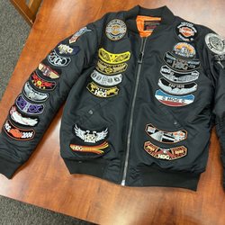 Essential Creations Chicago - This client needed all 50 of his patches sewn on his jacket.