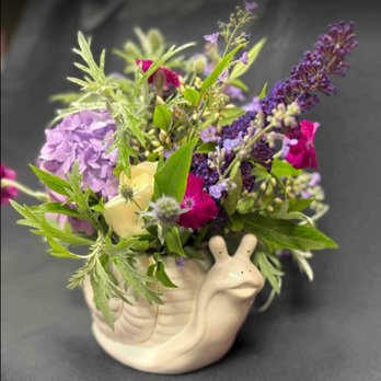 Moo and Company - Artful flower arrangement in a snail vase - Florists Near Me - Chattanooga, Tennessee Moo and Company - Artful flower arrangement in a snail vase - Florists Near Me - Chattanooga, Tennessee