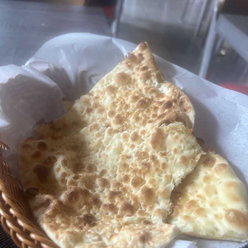 Oily flavorless naan. Oily flavorless naan.