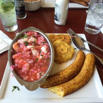 Gallo - Shrimp ceviche, with a side of tostones (green plantains) and sweet plantains. - Latin American Near Me - Patchogue, New York