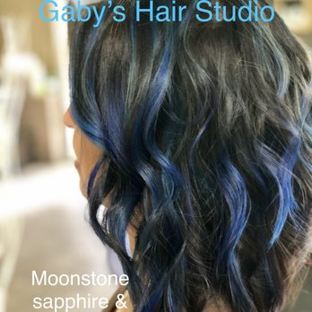 Gaby's Hair Studio - Add vibrant jewel tones for fall. Here we mixed Moonstone, sapphire and cobalt blue with ribbons of peacock green. Fall -Ready. - Hair Salons Near Me - Burbank, California Gaby's Hair Studio - Add vibrant jewel tones for fall. Here we mixed Moonstone, sapphire and cobalt blue with ribbons of peacock green. Fall -Ready. - Hair Salons Near Me - Burbank, California