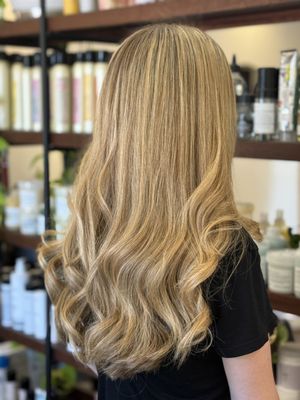 Blonding/Balayage - Balayage- 
Clients seeking natural, low-maintenance highlights with depth and dimension.

Blonding is the process of lightening the hair to achieve various shades of blonde—ranging from warm honey tones to icy platinum. This service can involve techniques like full lightening, balayage, or highlights, depending on the desired result. Whether you're going for a subtle sun-kissed glow or a bold transformation, blonding is customized to complement your skin tone and style.

✅ Best for: Clients wanting to go lighter all over or introduce brighter tones throughout their hair.