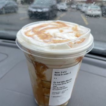 Starbucks - a cup of iced coffee on the dashboard of a car - Coffee & Tea Near Me - Calgary, Alberta Starbucks - a cup of iced coffee on the dashboard of a car - Coffee & Tea Near Me - Calgary, Alberta