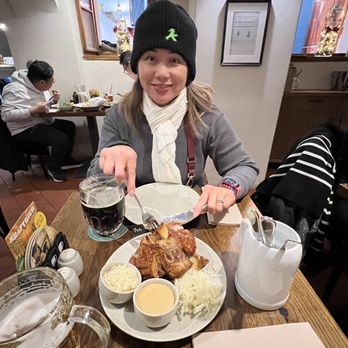 Pork’s - Jo getting ready to dig in and try the knuckles - Czech Near Me - Malá Strana, Puerto Rico Pork’s - Jo getting ready to dig in and try the knuckles - Czech Near Me - Malá Strana, Puerto Rico