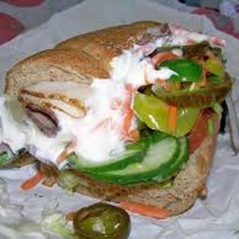 Subway - a sub sandwich with pickles and cheese - Fast Food Near Me - Rio Rancho, New Mexico