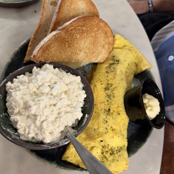 Ladybird Cafe - Ham and sausage omelette with cottage cheese and sour dough - Breakfast & Brunch Near Me - Terre Haute, Indiana Ladybird Cafe - Ham and sausage omelette with cottage cheese and sour dough - Breakfast & Brunch Near Me - Terre Haute, Indiana