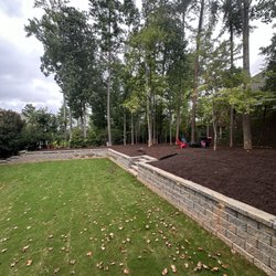 Riverwalk Landscaping - 3,000 SQ Ft. of Freshly Laid Bermuda sod along with 26 yards of brown dyed mulch.