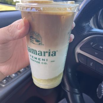 Qamaria Yemeni Coffee - Iced Pistachio Latte - Coffee & Tea Near Me - Aurora, Illinois Qamaria Yemeni Coffee - Iced Pistachio Latte - Coffee & Tea Near Me - Aurora, Illinois