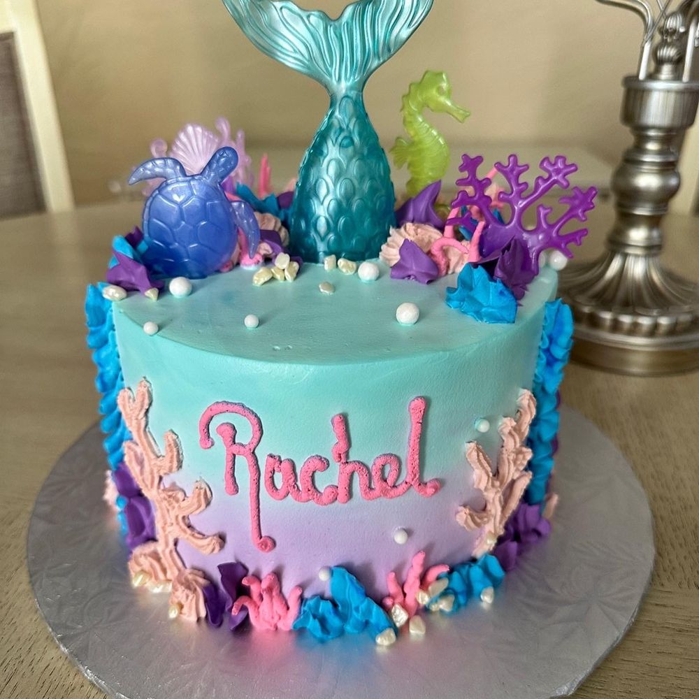Claudia's Cakes - My daughter's adorable mermaid-themed birthday cake. Chocolate and vanilla marble cake with whipped cream frosting. Delicious!! ‍ - Cupcakes Near Me - Hurst, Texas