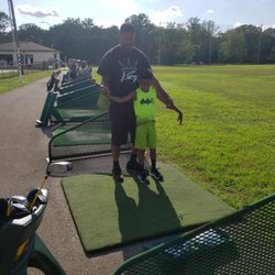 Sahm Driving Range - Having a good time today! Stretches before we start swinging