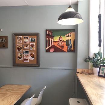 Gaby's Cafe - a dining room with a table and chairs - Cafes Near Me - Kingston, Ontario