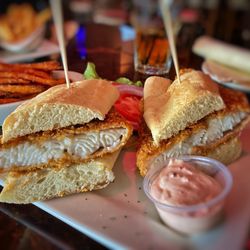 JB Hook's - Hook's Famous Crunchy Fish Filet with a side of Sweet potato fries. From the lunch menu.