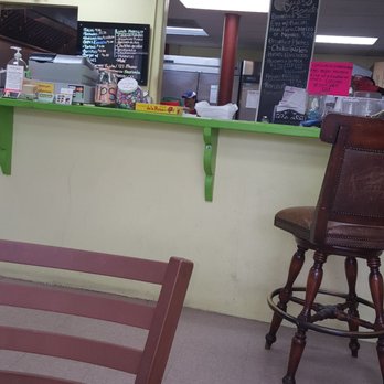 Queso Bonito - The counter with menus behind it. - Mexican Near Me - Humble, Texas Queso Bonito - The counter with menus behind it. - Mexican Near Me - Humble, Texas