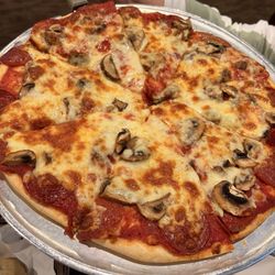 Sausage, pepperoni & mushroom pizza