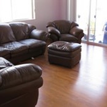 Jade Floors - a living room with leather furniture - Flooring Near Me - Fort Collins, Colorado Jade Floors - a living room with leather furniture - Flooring Near Me - Fort Collins, Colorado