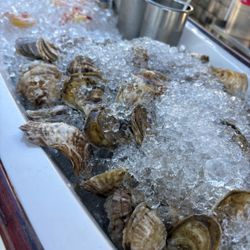 Home Port Restaurant - The oyster boat you walk past on the way to your outdoor seating