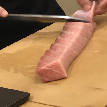 Sushi By M - Chef cutting up some Toro - Sushi Bars Near Me - New York, New York Sushi By M - Chef cutting up some Toro - Sushi Bars Near Me - New York, New York