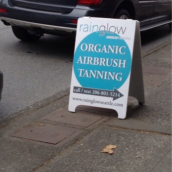 Rainglow Airbrush Tanning - Sandwich board outside on 35th Ave - Spray Tanning Near Me - Seattle, Washington Rainglow Airbrush Tanning - Sandwich board outside on 35th Ave - Spray Tanning Near Me - Seattle, Washington