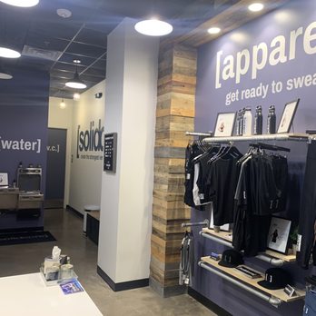 [solidcore] - Retail wall , water , and bathrooms - Pilates Near Me - Dallas, Texas