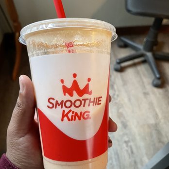 Smoothie King - a hand holding a smoothie - Juice Bars & Smoothies Near Me - Middletown, New York Smoothie King - a hand holding a smoothie - Juice Bars & Smoothies Near Me - Middletown, New York