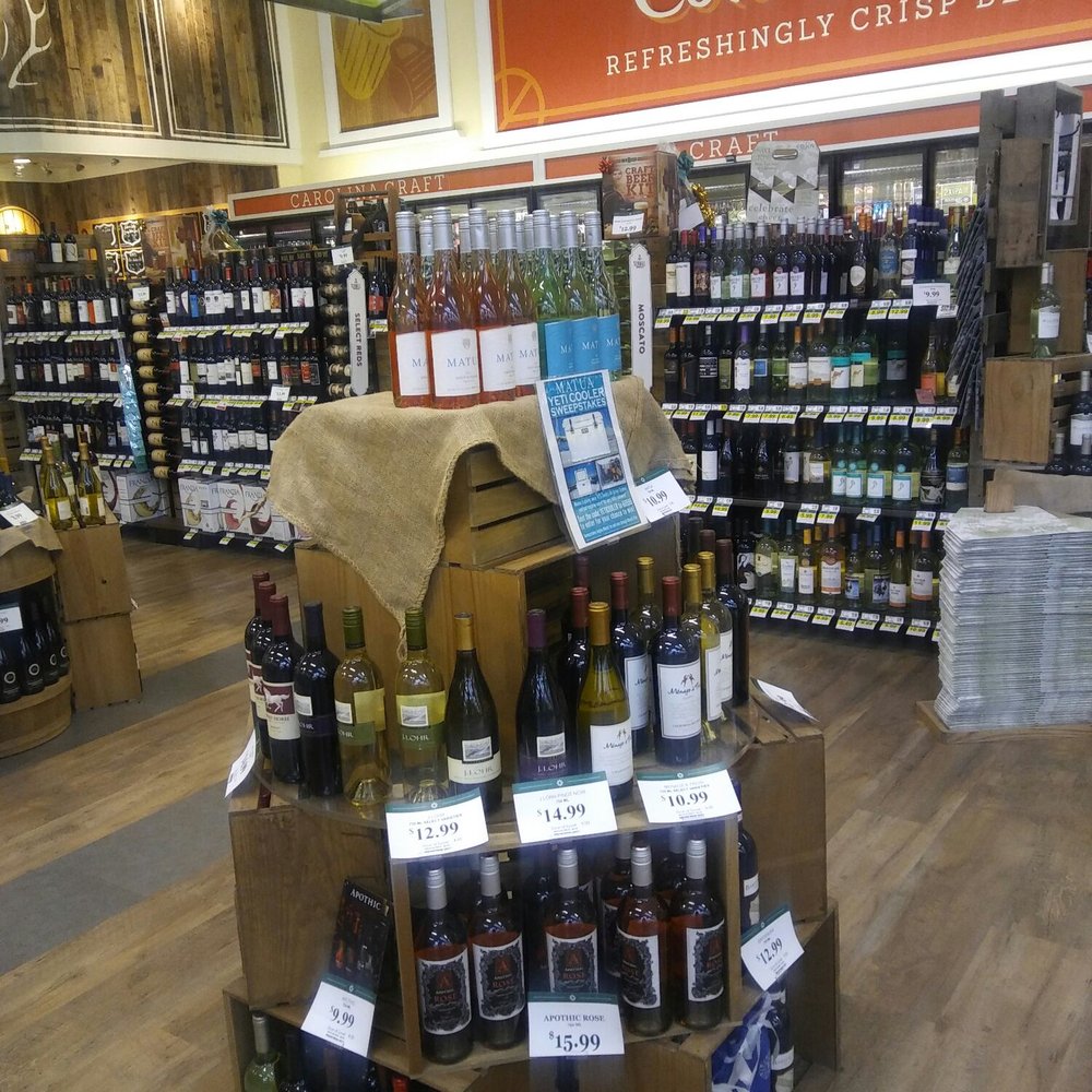 Lowes Foods - This is just a portion of the wine and beer selection they have....you can even get a cup to shop with its amazing here - Grocery Near Me - Jacksonville, North Carolina