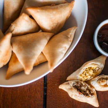 Ottawa Samosa - a plate of samosas and dipping sauce - Food Delivery Services Near Me