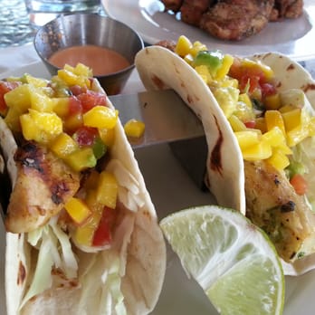 Earls Kitchen + Bar - Happy Hour Fish Tacos $4.50 each - New American Near Me - Miami, Florida Earls Kitchen + Bar - Happy Hour Fish Tacos $4.50 each - New American Near Me - Miami, Florida