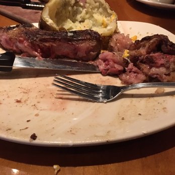 Outback Steakhouse - Aftermath of 22 oz ribeye. A lot of fat on the steak. :( - Steakhouses Near Me - Hurst, Texas Outback Steakhouse - Aftermath of 22 oz ribeye. A lot of fat on the steak. :( - Steakhouses Near Me - Hurst, Texas