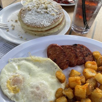 Eggs 'n Things Ko Olina - Macadamia Nut Pancakes in back, Portuguese sausage, potatoes are soooo good too - American Near Me - Kapolei, Hawaii Eggs 'n Things Ko Olina - Macadamia Nut Pancakes in back, Portuguese sausage, potatoes are soooo good too - American Near Me - Kapolei, Hawaii