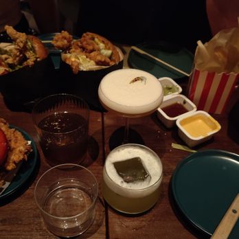 Double Chicken Please - Japanese Cold Noodles, Cold Pizza, Custard Bun, Mango Sticky Rice, mochi donut, hot honey, and salted egg yolk chicken sandwiches - Cocktail Bars Near Me - New York, New York