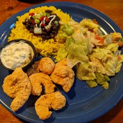 Rae's Coastal Cafe - Fried shrimp with rice and beans and a side Rae's coastal salad