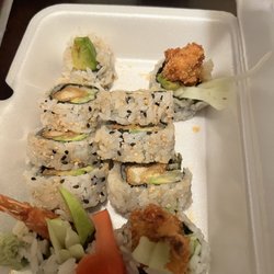 Kaede Hibachi Japanese Restaurant - Shrimp tempura to the left Spider roll to the right (favorite!) (It doesn't say on the menu but it's a tempura soft shell crab roll)