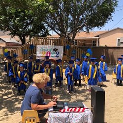 Playhouse Preschool Kindergarten & First Grade - Kindergarten class of 2022 graduation with teacher Ms Lyn