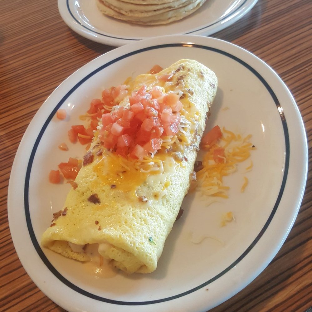 IHOP - Bacon temptation omelette w/ pancakes - Breakfast & Brunch Near Me - Elizabeth, New Jersey IHOP - Bacon temptation omelette w/ pancakes - Breakfast & Brunch Near Me - Elizabeth, New Jersey