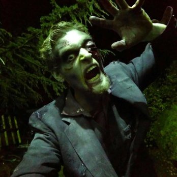 Milburn's Haunted Manor - Our resident zombie. He likes to hang around our U-take photo booth. - Haunted Houses Near Me - Hubbard, Oregon Milburn's Haunted Manor - Our resident zombie. He likes to hang around our U-take photo booth. - Haunted Houses Near Me - Hubbard, Oregon