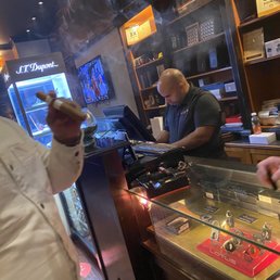 The Register where you purchase your cigars selection, get it lit, and can buy merchandise. Dope vibes