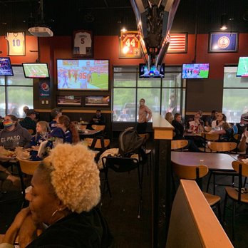 Buffalo Wild Wings - a large group of people sitting in a restaurant - American Near Me - Norfolk, Virginia