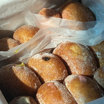 Leonard's Bakery - One dozen, one of each flavor + flavor of the month was mango. - Bakeries Near Me - Honolulu, Hawaii
