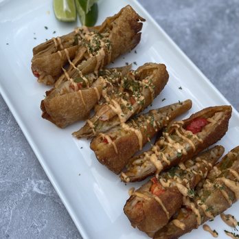 Cafe’ Neo Soul - a plate of hotdogs with sauce and garnish - Comfort Food Near Me - Mount Holly, New Jersey Cafe’ Neo Soul - a plate of hotdogs with sauce and garnish - Comfort Food Near Me - Mount Holly, New Jersey