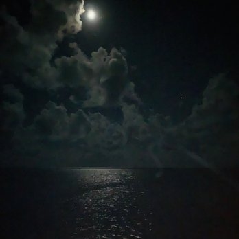 Isla Bella Beach Resort - Sitting beachside next to the bar. The moon shining on the ocean through the clouds was breathe taking. - Resorts Near Me - Marathon, Florida Isla Bella Beach Resort - Sitting beachside next to the bar. The moon shining on the ocean through the clouds was breathe taking. - Resorts Near Me - Marathon, Florida