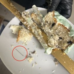 Needle found in wedding cake