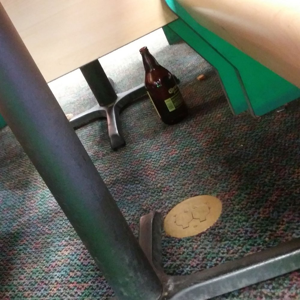 Chuck E. Cheese - Beer bottle under a table... - Pizza Near Me - Bakersfield, California Chuck E. Cheese - Beer bottle under a table... - Pizza Near Me - Bakersfield, California